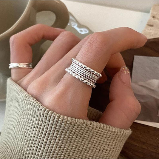 Leicht luxuriöser geflochtener, gedrehter Multilayer-Ring – verstellbar, offenes Design