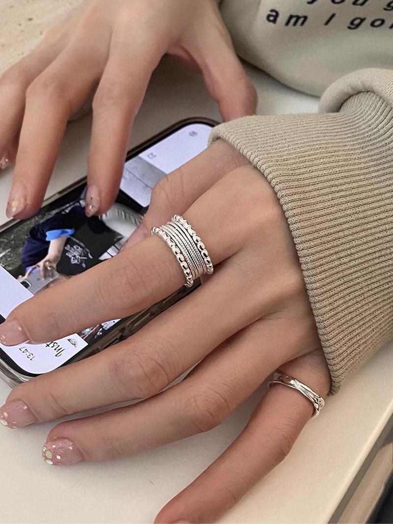 Leicht luxuriöser geflochtener, gedrehter Multilayer-Ring – verstellbar, offenes Design